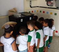 USO DO BIOFERTILIZANTE NA HORTA DO PROJETO COLORIR SUSTENTÁVEL - ELKEM